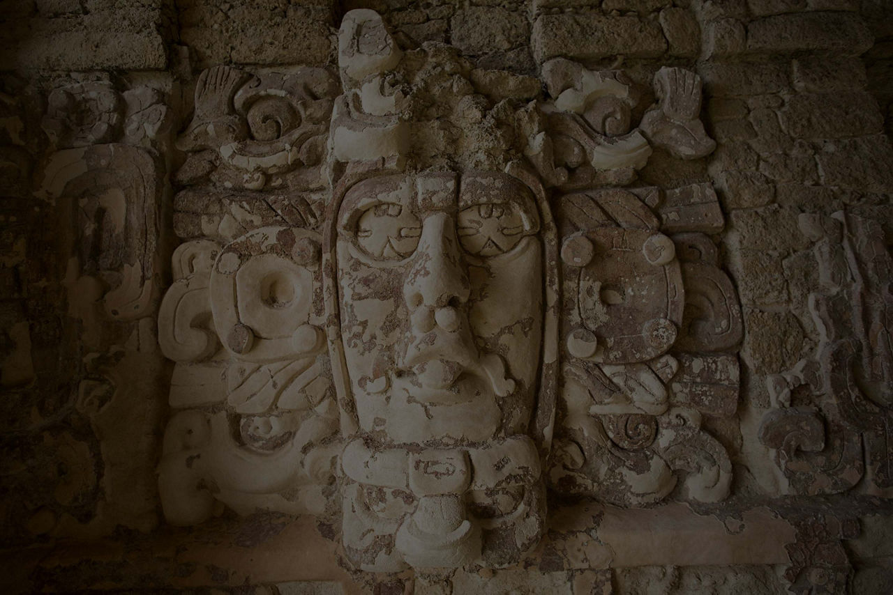 quintana roo mexico temple of the masks statue slant