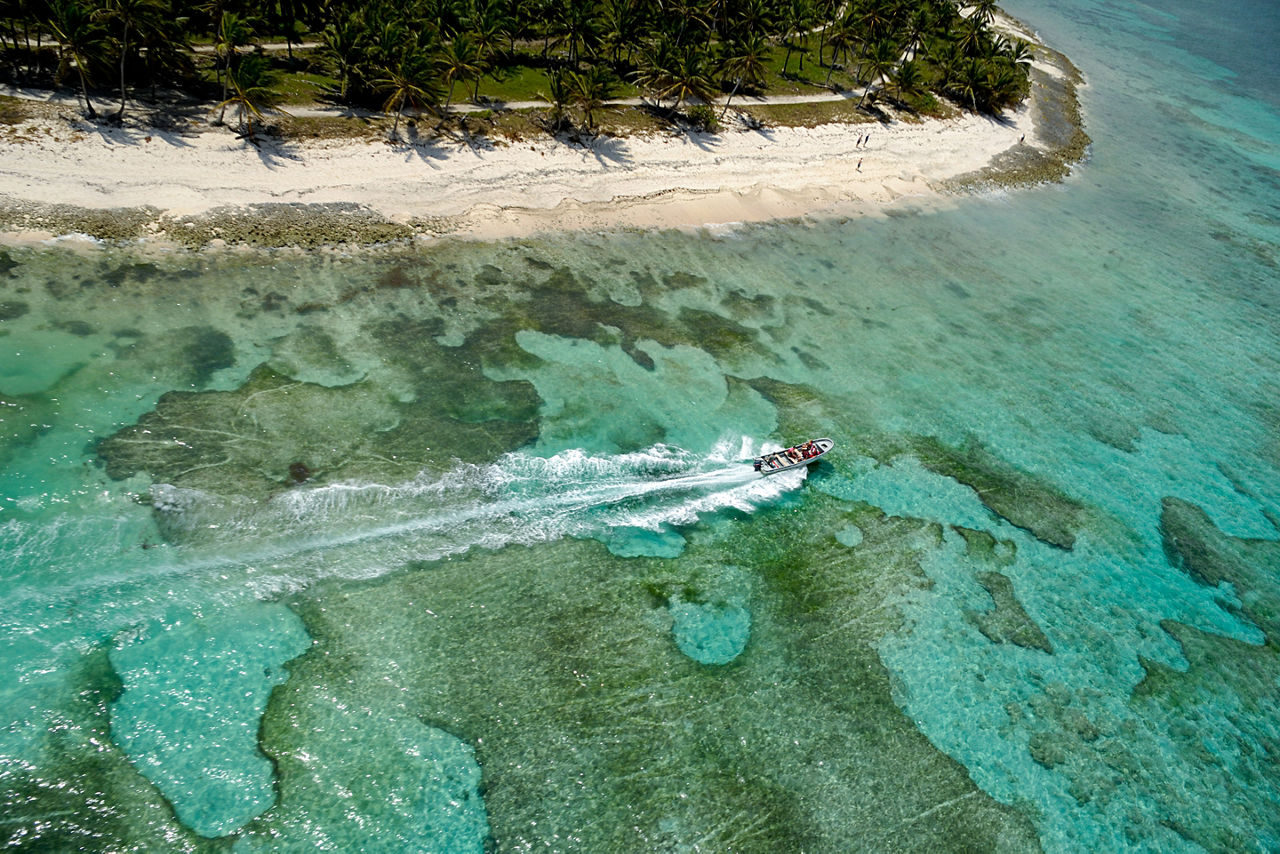 Helicopter view of a Caribbean speed boat tour. The Caribbean.