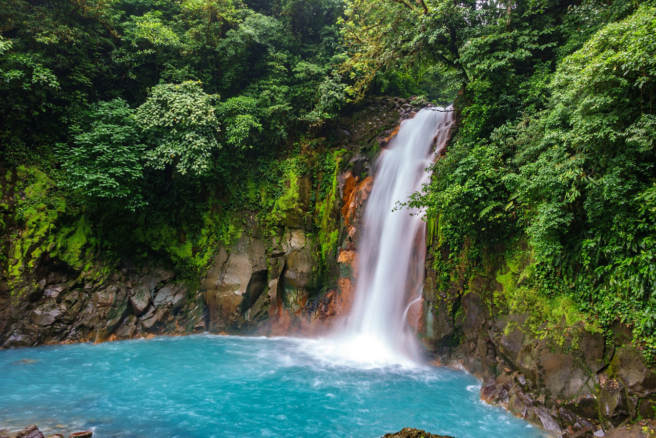 Aerial view of waterfall and lush jungles to tour. Costa Rica.