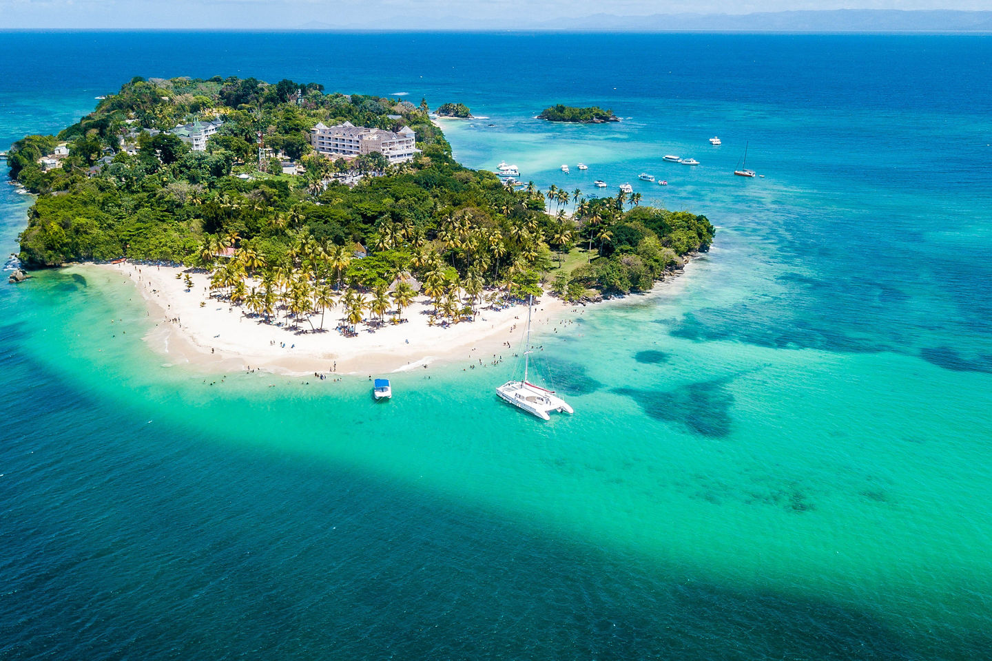 Samaná summer brings hot, humid weather, brief rains, festivals, ziplines, snorkeling, and Cayo Levantado beaches. - Samaná, Dominican Republic