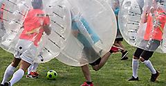  Close up view of bubble football balls game.