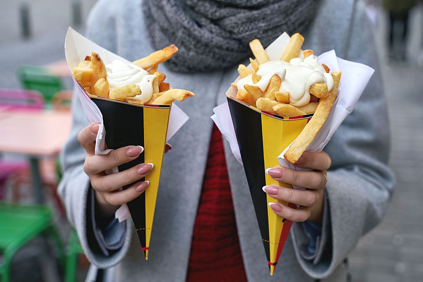 Try Rotterdam’s patat — crispy Dutch fries topped with mayo, satay sauce and onions. - Rotterdam, Netherlands