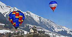 hot air balloons over the swiss alps