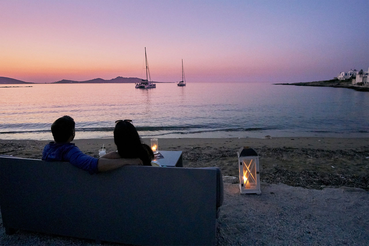 Couple lounging in the island of Paros, Greece