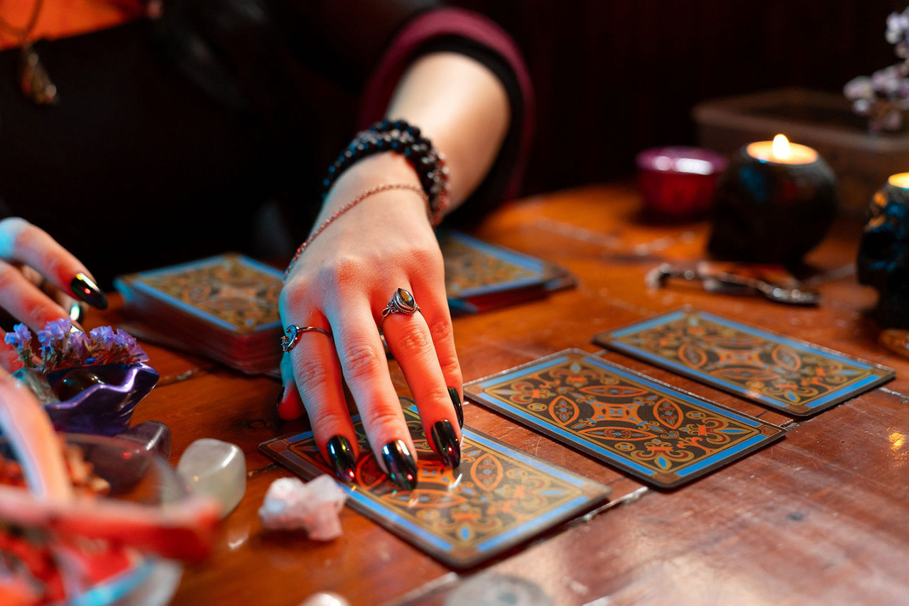Tarot card reading on a wooden table