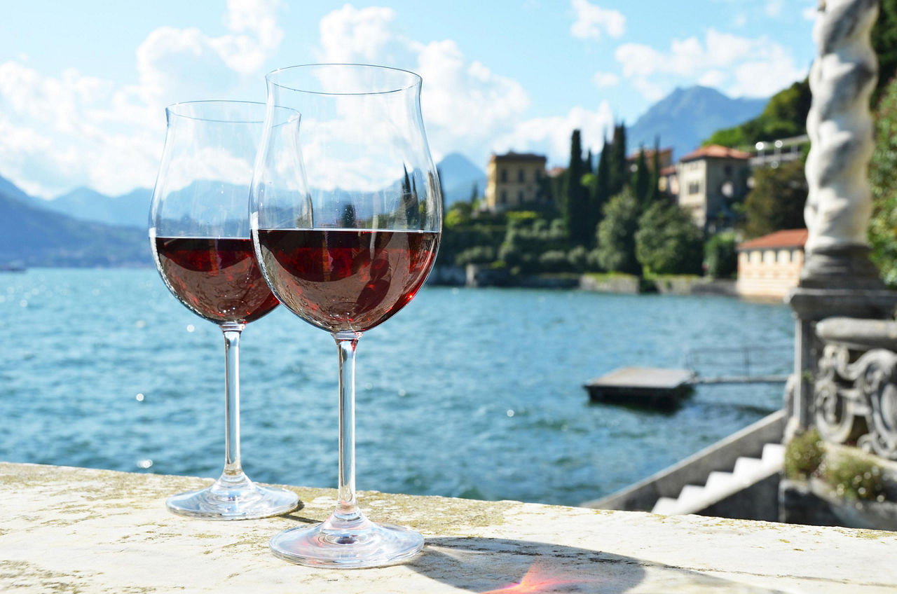 Italy, Glasses of Wine with Ocean Background