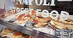 Neapolitan Street food stand. Calzone fritto