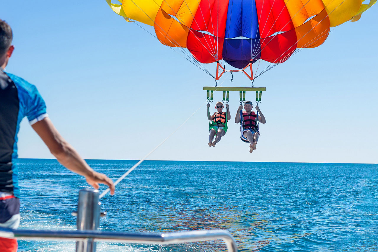Adrenaline junkies can parasail over Banderas Bay