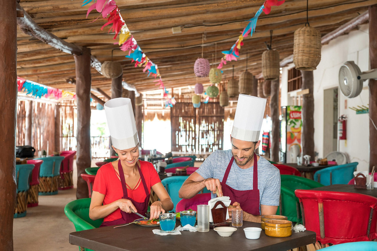 Mexico Costa Maya Cooking Classes Couple Making Guacamole