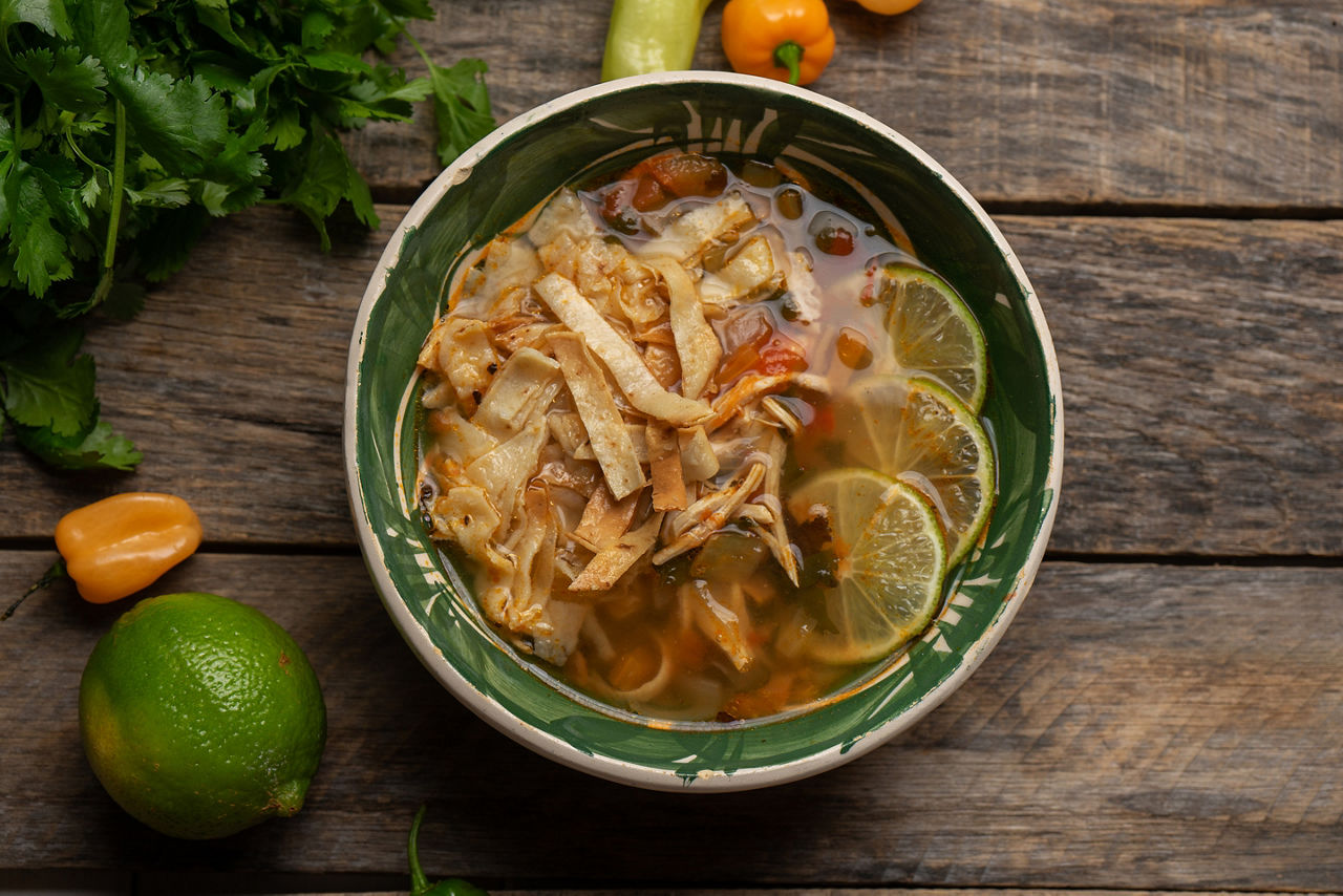 Fresh Mexican lime soup with chicken. Mexico.
