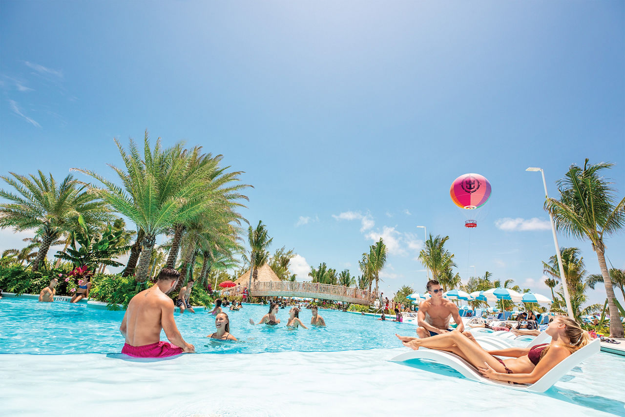 Guests swimming in Oasis Lagoon, Perfect Day at CocoCay