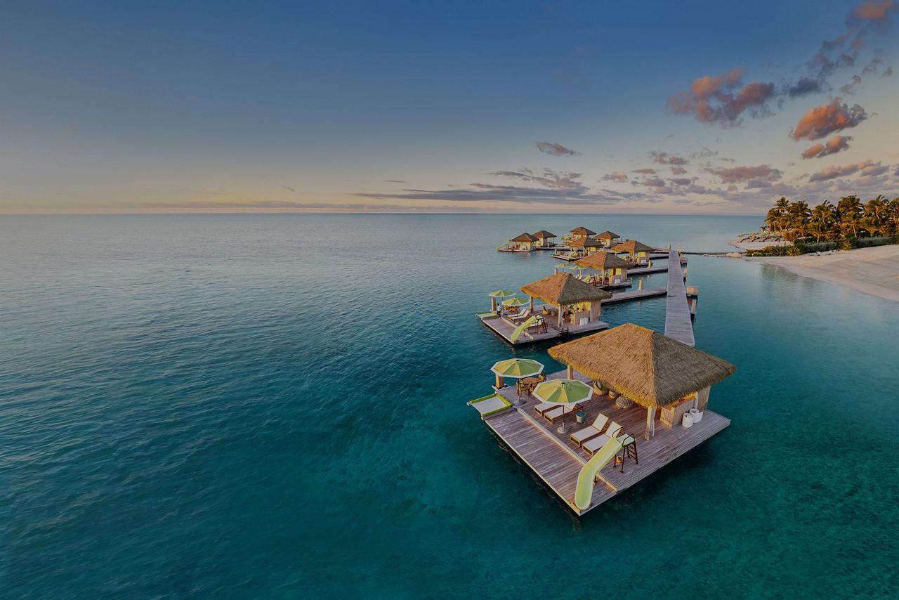 Aerial overlooking overwater cabanas at Perfect Day CocoCay