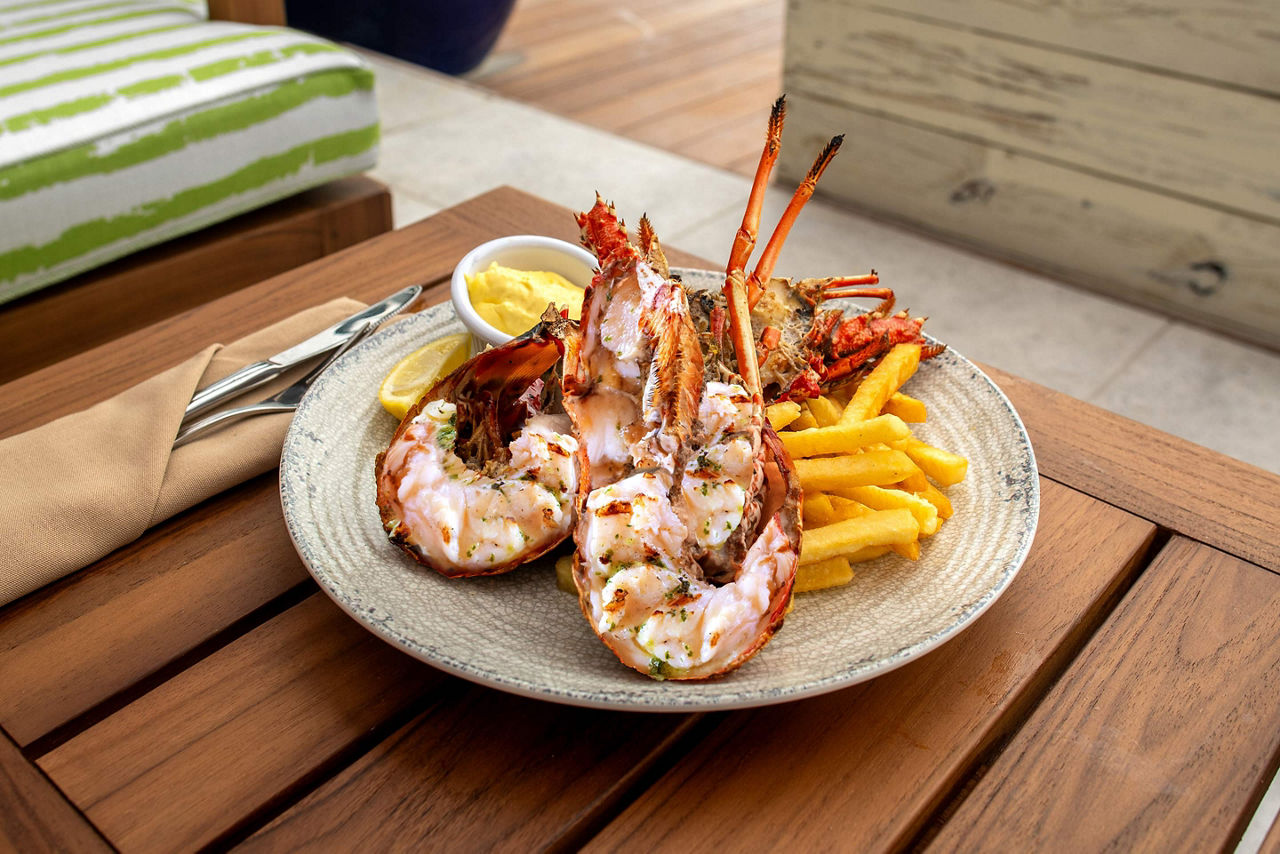 Lobster with fries at Coco Beach Club restaurant