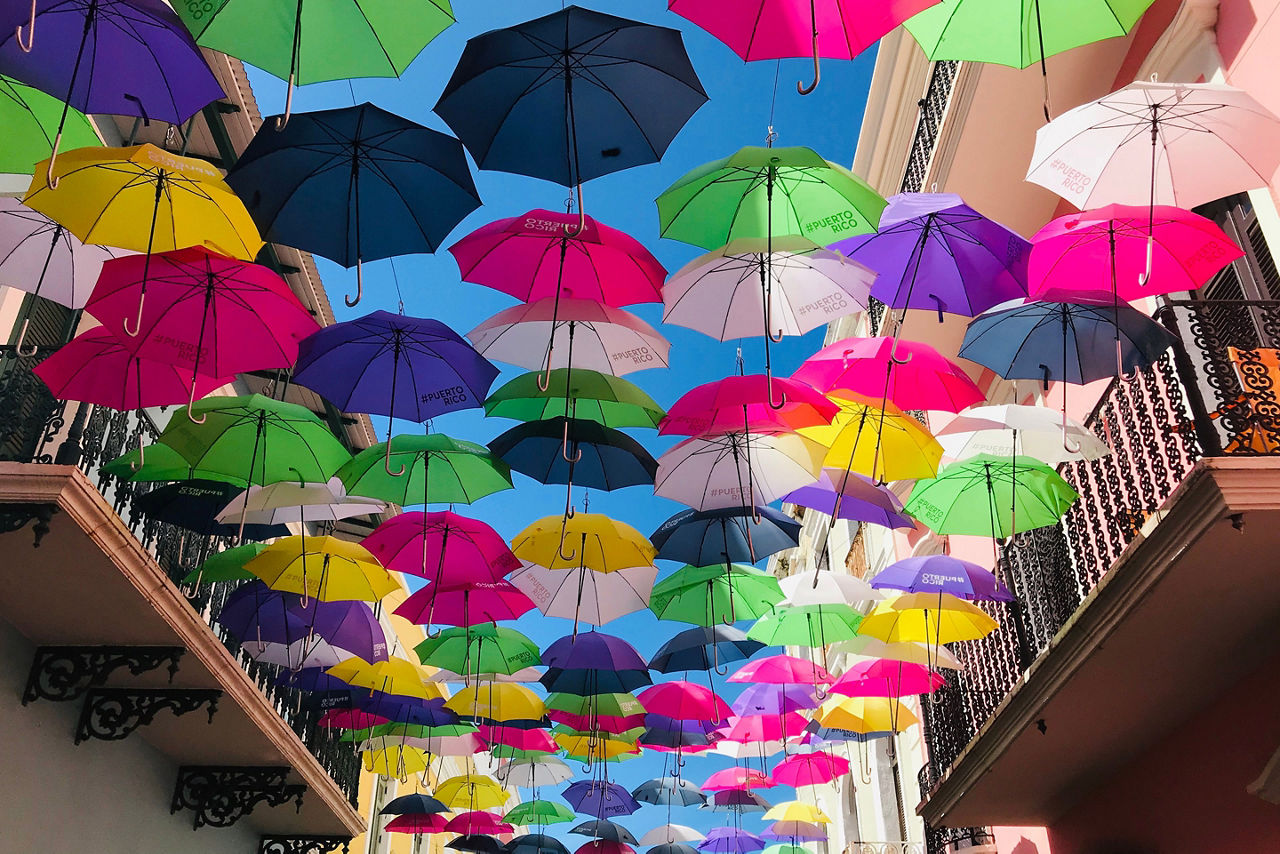 Bright Umbrellas handing above the street in Old San Juan Puerto Rico
