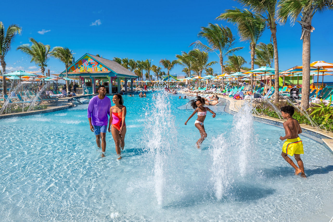 Family at The Shallow End Pool with fountains at Royal Beach Club Paradise Island