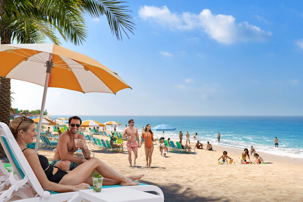 RBC Paradise Island, couple with drinks chilling under umbrella