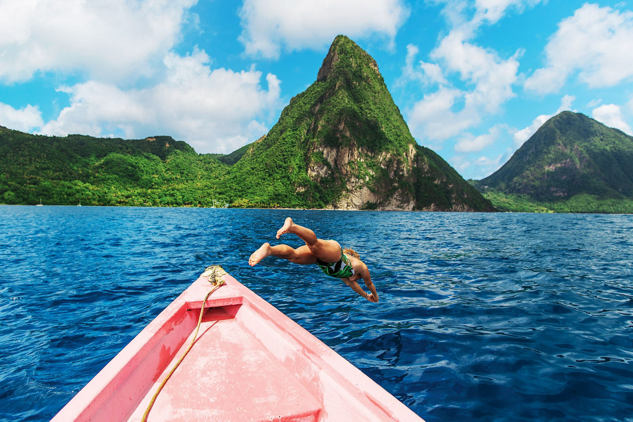 St. Lucia The Pitons Man Jumping Off Boat