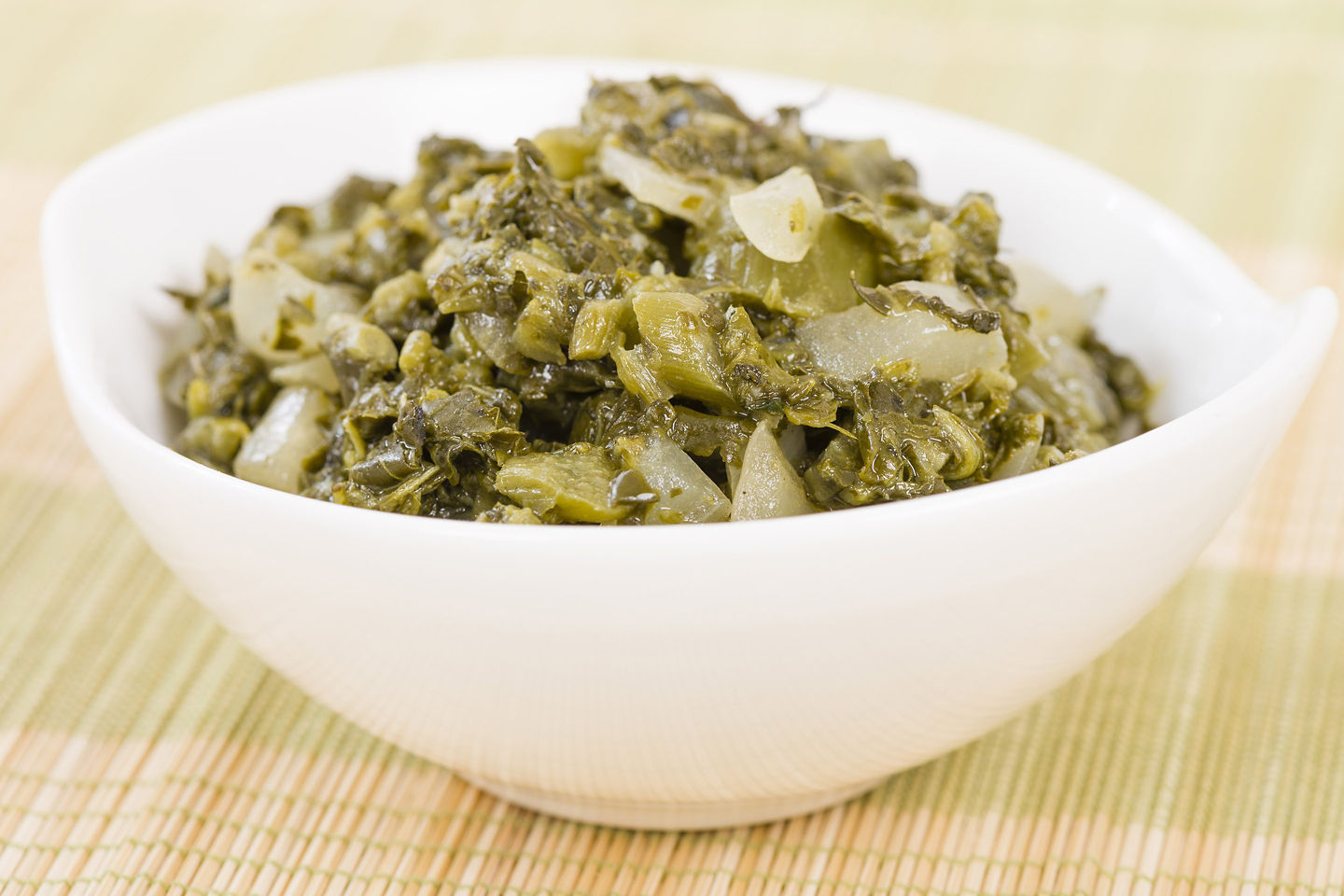 Callaloo, a flavorful Jamaican green, is sautéed with spices and complements both breakfast and dinner dishes. - Falmouth, Jamaica