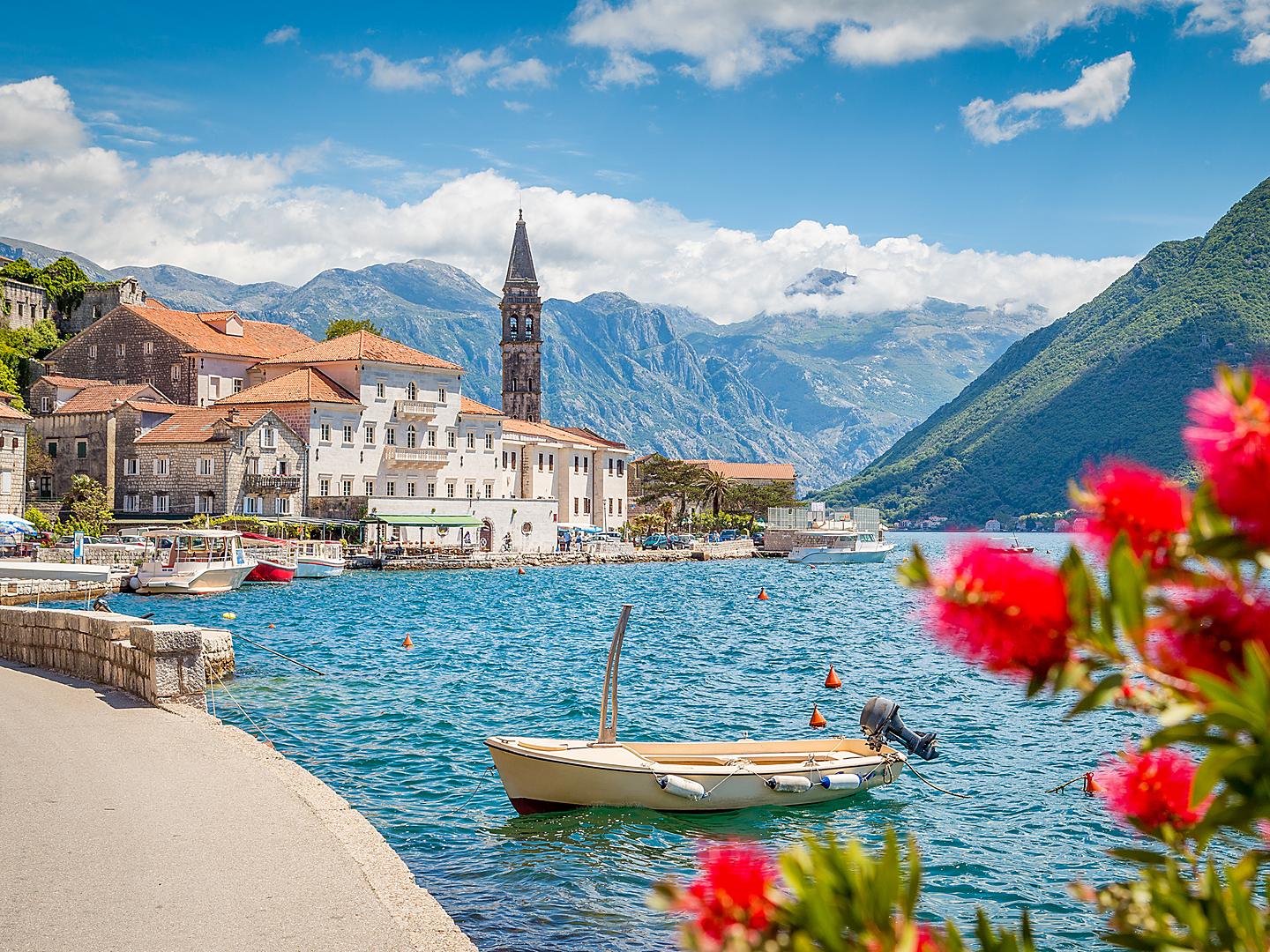 Scenic panorama view of the historic town of Perast at famous Bay of Kotor 