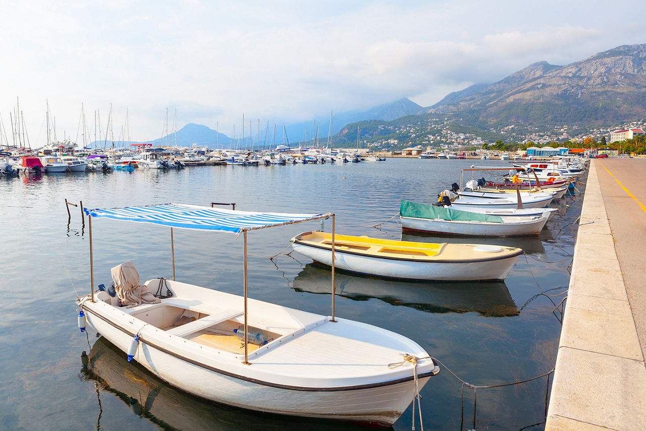 Harbor with boats in Bar town from Montenegro . Moored boats on the berth