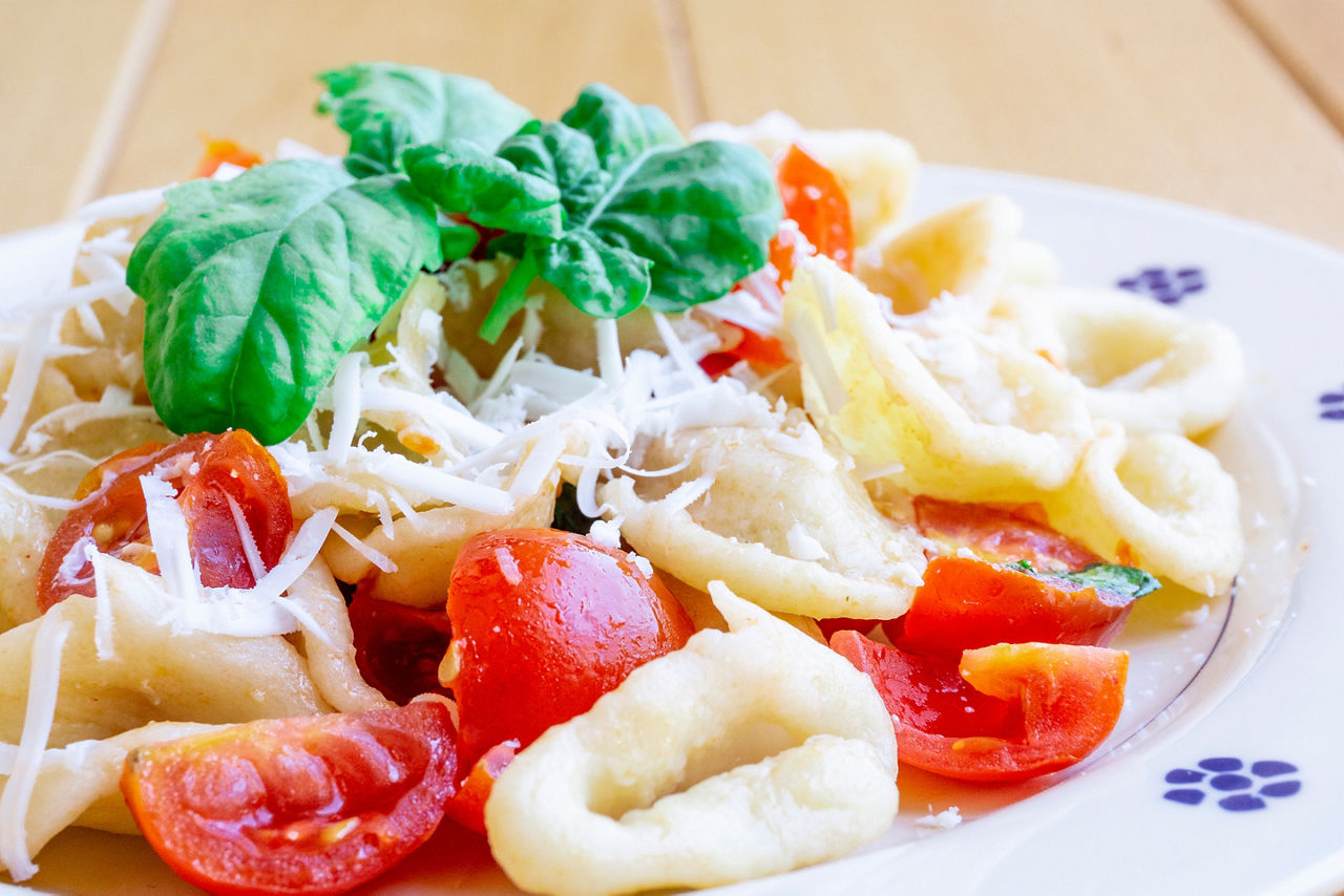 Orecchiette with tomato, fresh basil and fresh cheese 