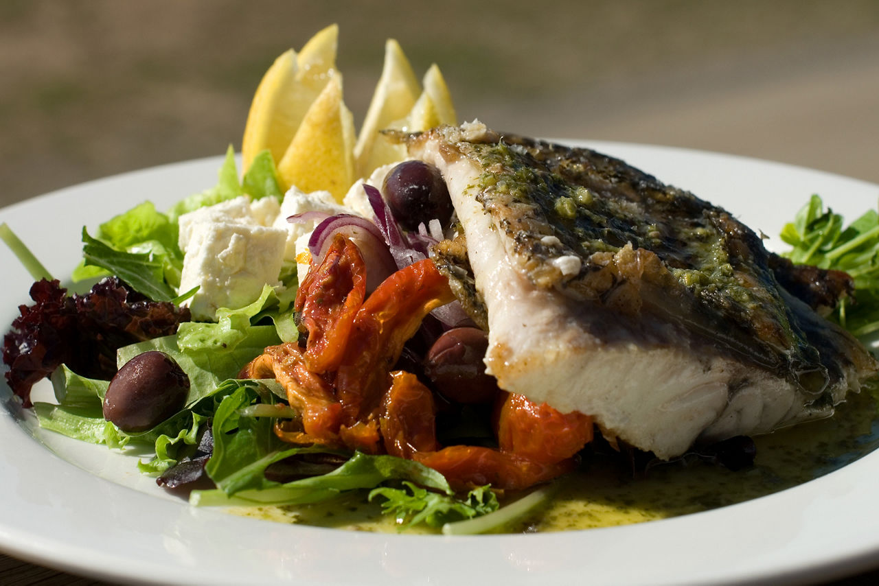 Grilled Barramundi, served with a Greek-style Salad