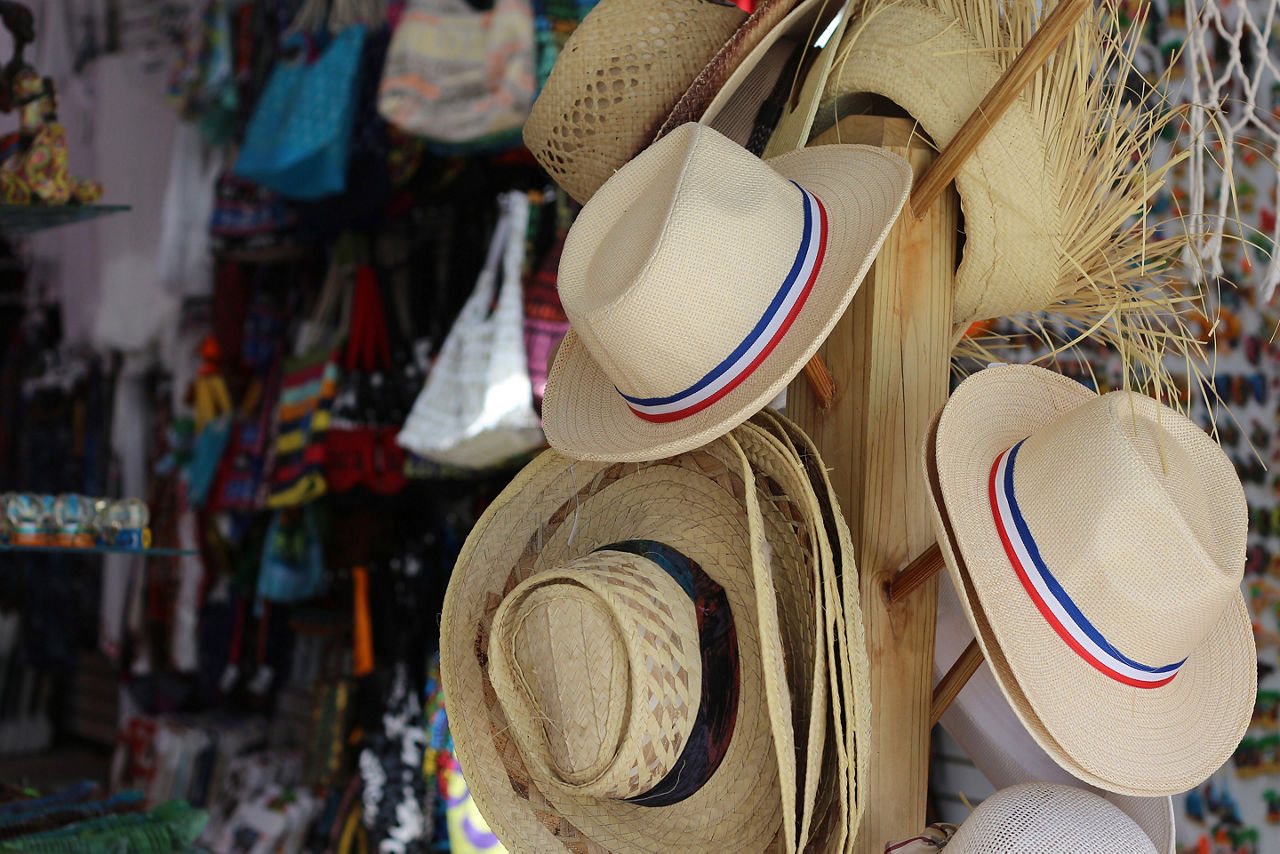 Sale of hats in a gift shop at the Bayahibe beach