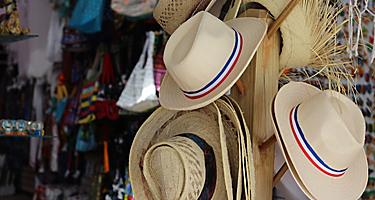 Sale of hats in a gift shop at the Bayahibe beach