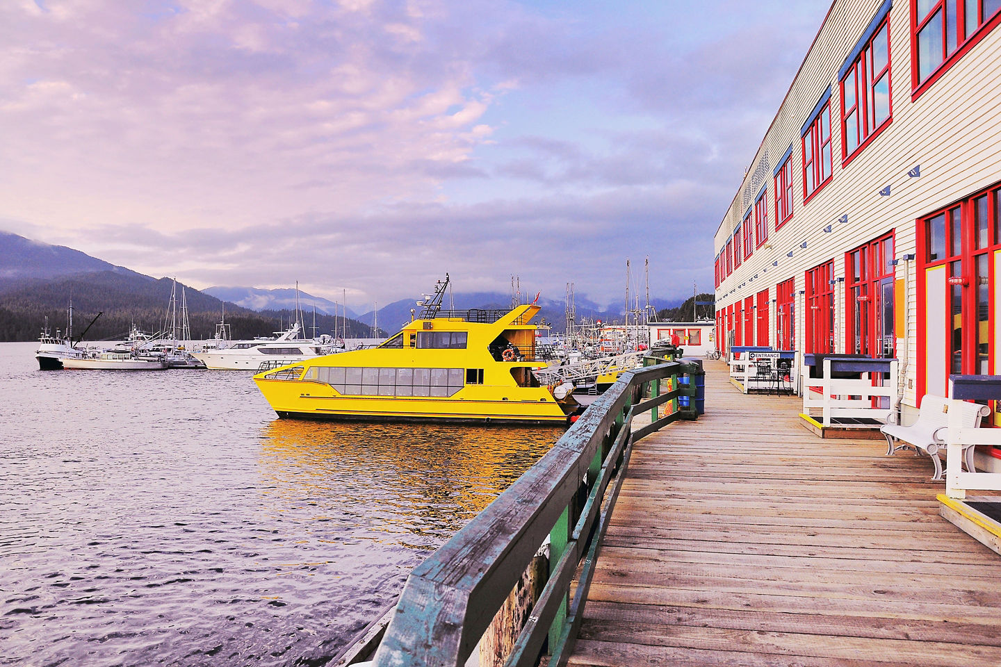 Sunset over bay with boats silhouetted against glowing sky. - Prince Rupert, British Columbia