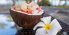 Fresh Poission Cru (raw fish) in a coconut shell.