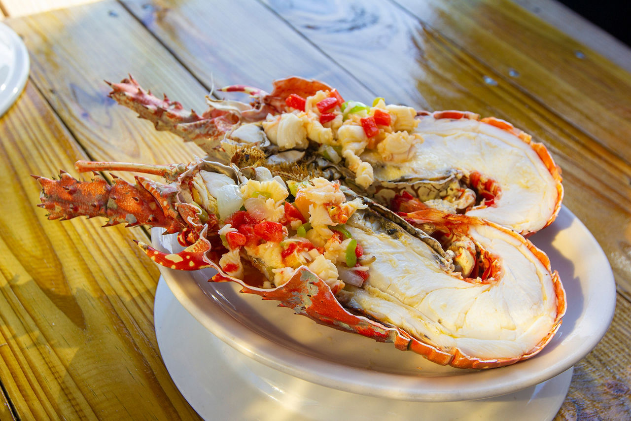 Caribbean lobster slice in the grill Puerto Rico traditions seafood plate, Samana