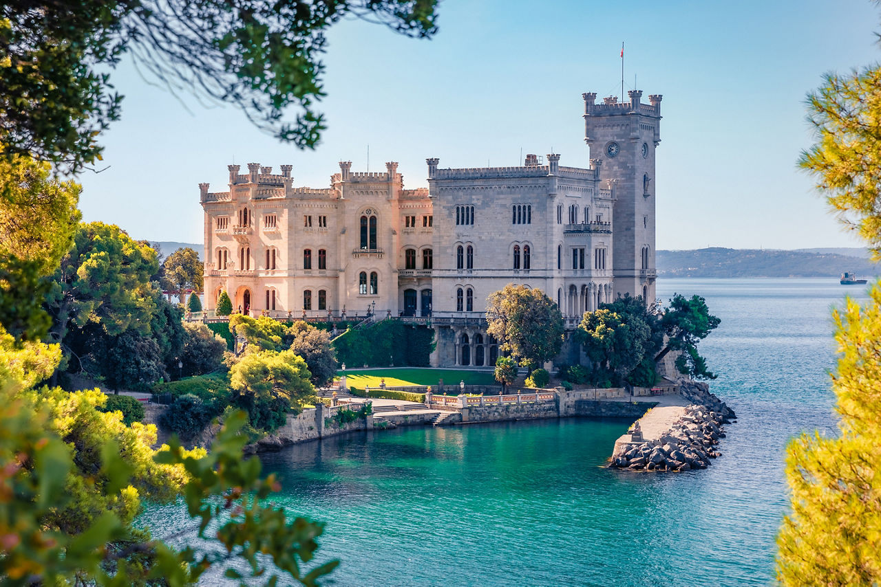 Beautiful summer view of Miramare Castle. Adorable morning seascape of Adriatic sea.