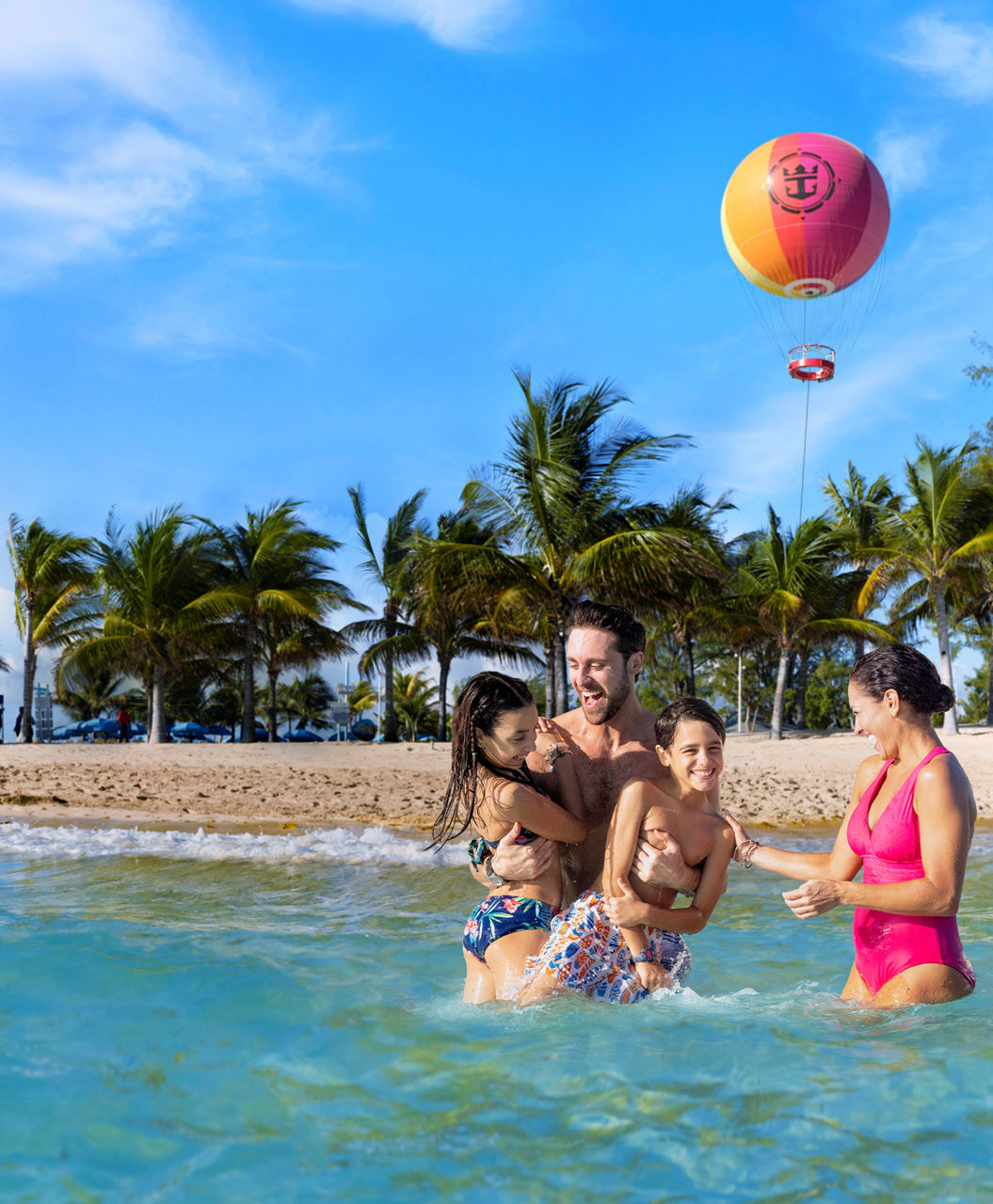 Dad holding two kids Mom CocoCay Beach HP Mobile 750 910 FAM NF 2x