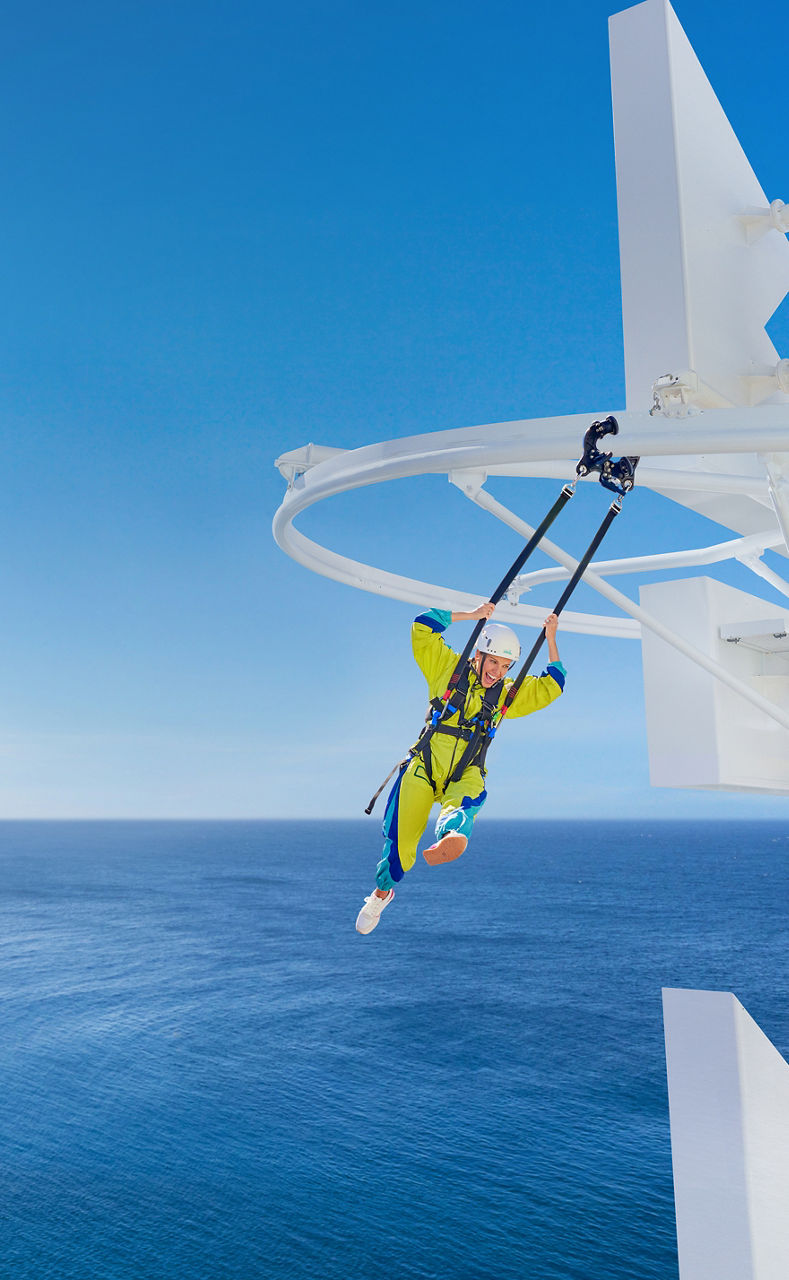 Girl strapped in at Crowns Edge on Icon of the Seas