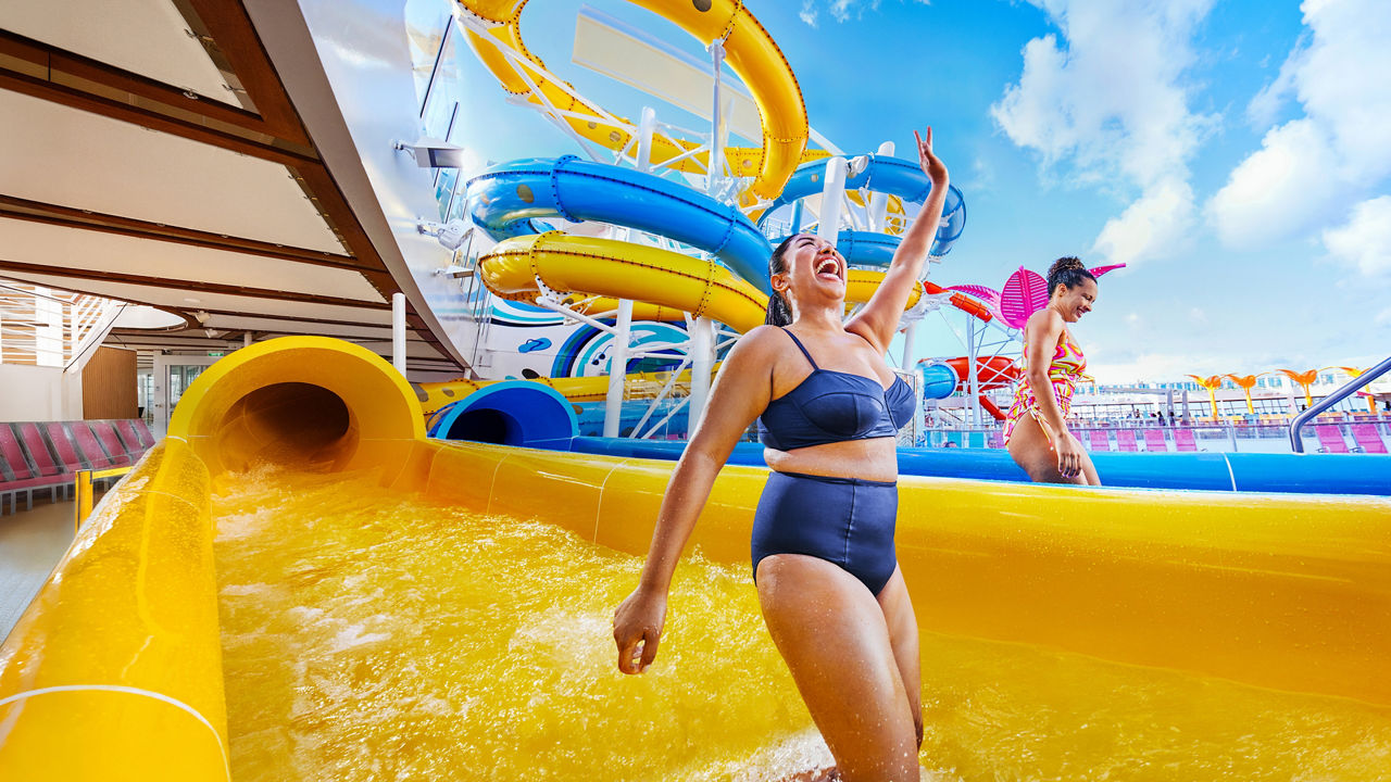 november caribbean cruise deals woman enjoying perfect storm splashaway bay hp jumbotron 1920 1080