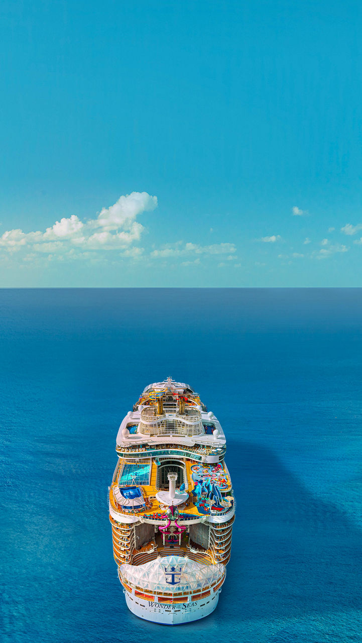 april caribbean cruises deals back aerial view wonder of the seas poster 608 1080
