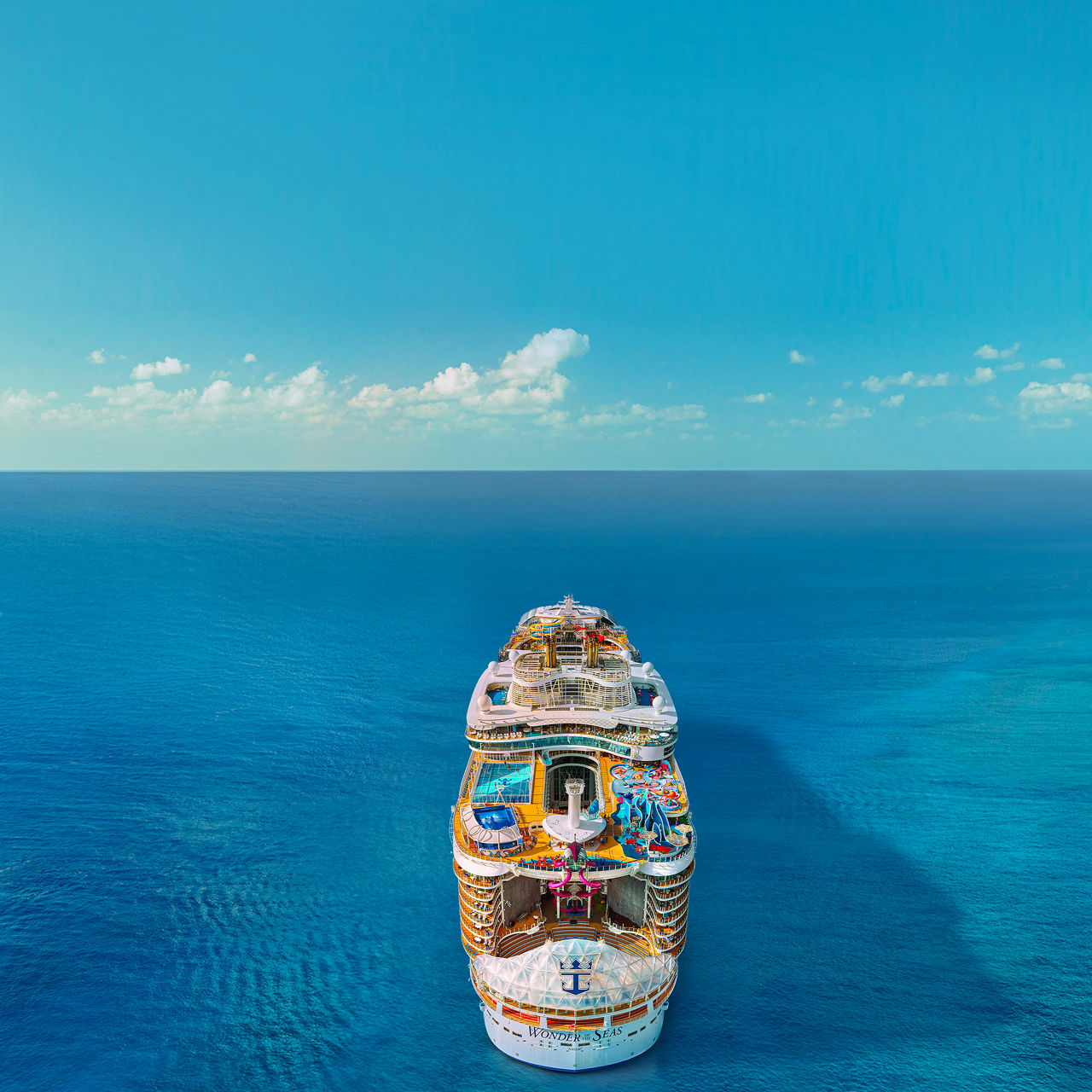 april caribbean cruises deals back aerial view wonder of the seas square 1050 1050