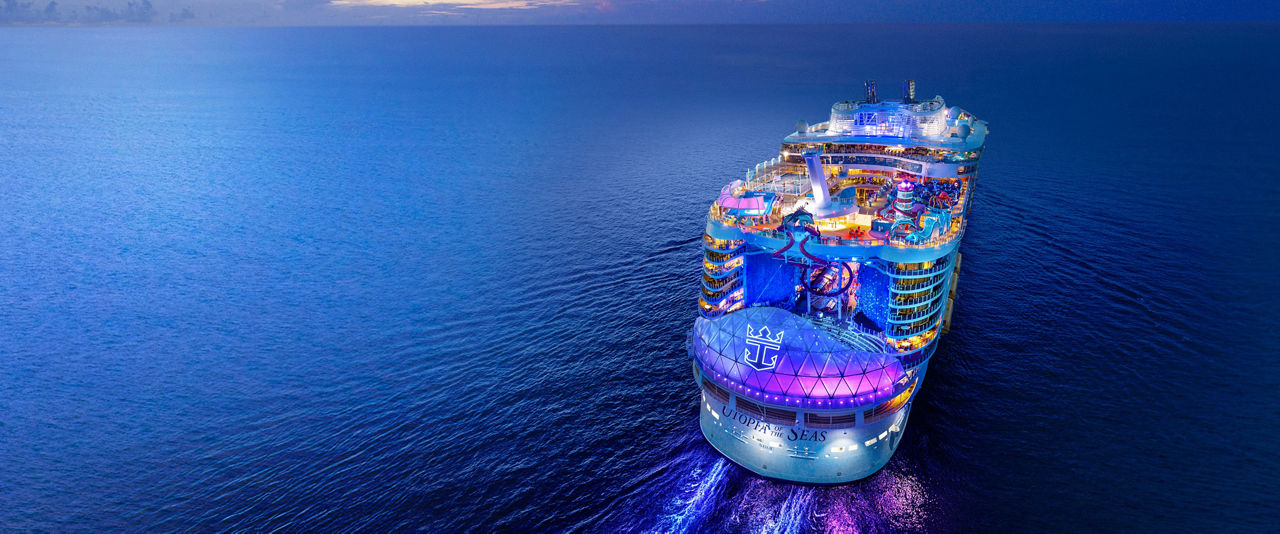 july caribbean cruises deals back aerial view at night utopia of the seas hero 1920 800