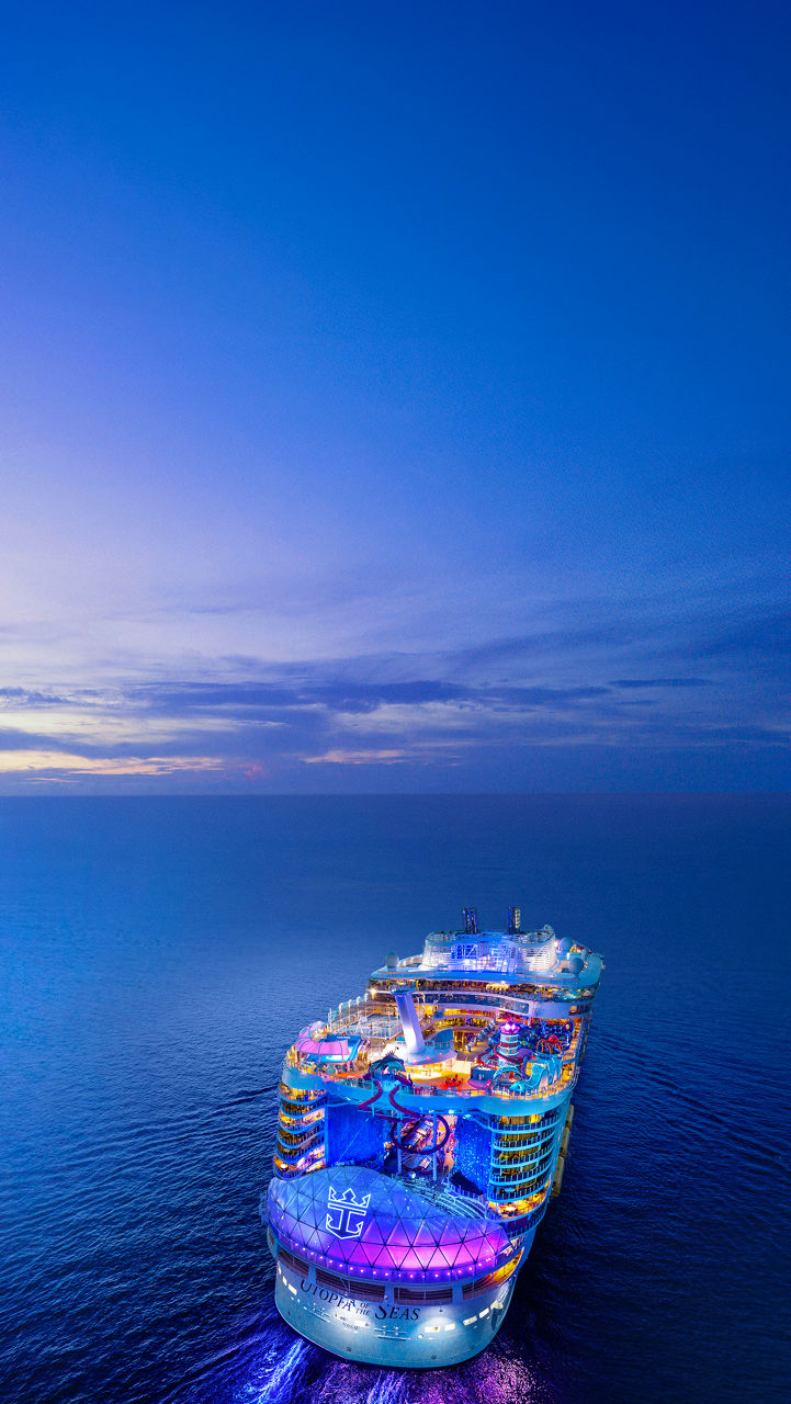 july caribbean cruises deals back aerial view at night utopia of the seas poster 608 1080