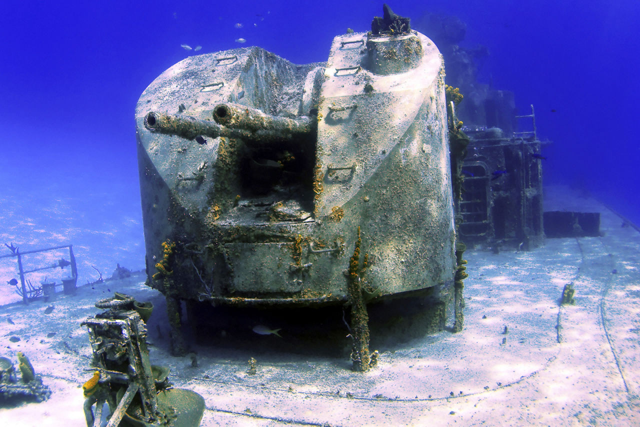 View of cannon guns on a sunken shipwreck. The Caribbean.