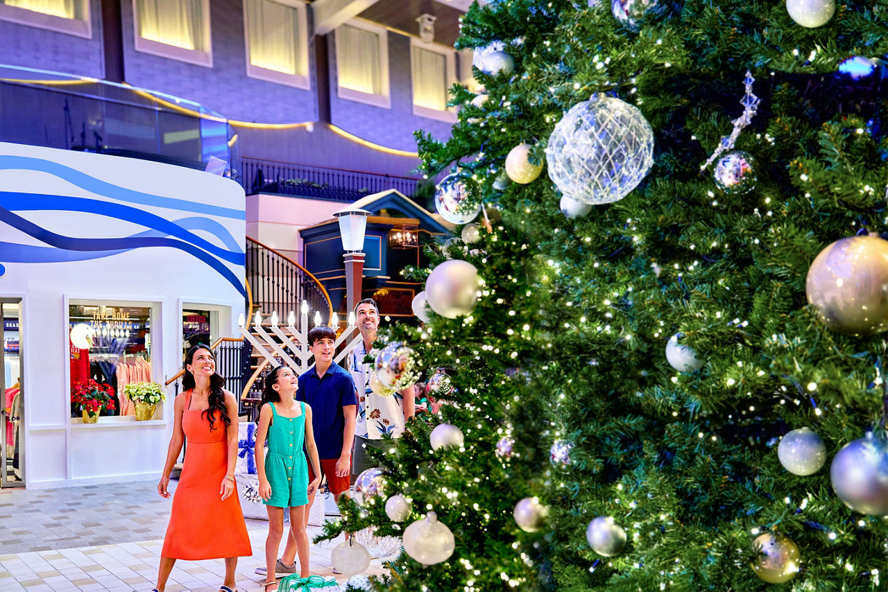 Family appreciating holiday season at Royal Promenade