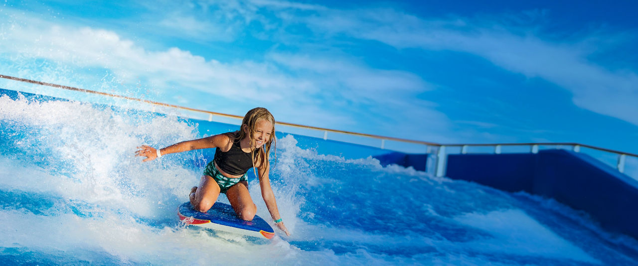 Girl riding a boogie board in Flowrider | HP 