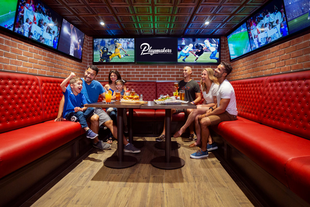 Friends and couple at Playmakers Sports Bar & Arcade