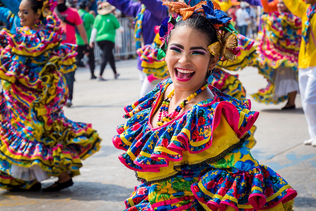 Dancers with colorful costumes in Barranquilla Carnival 