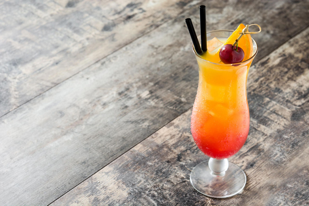 Sex on the beach cocktail wooden table