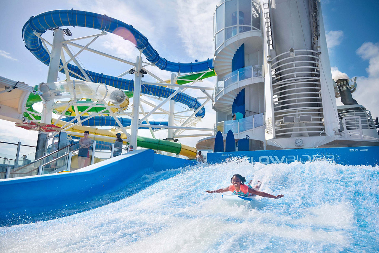 Freedom of the Seas, teen on surfboard at Flow Rider