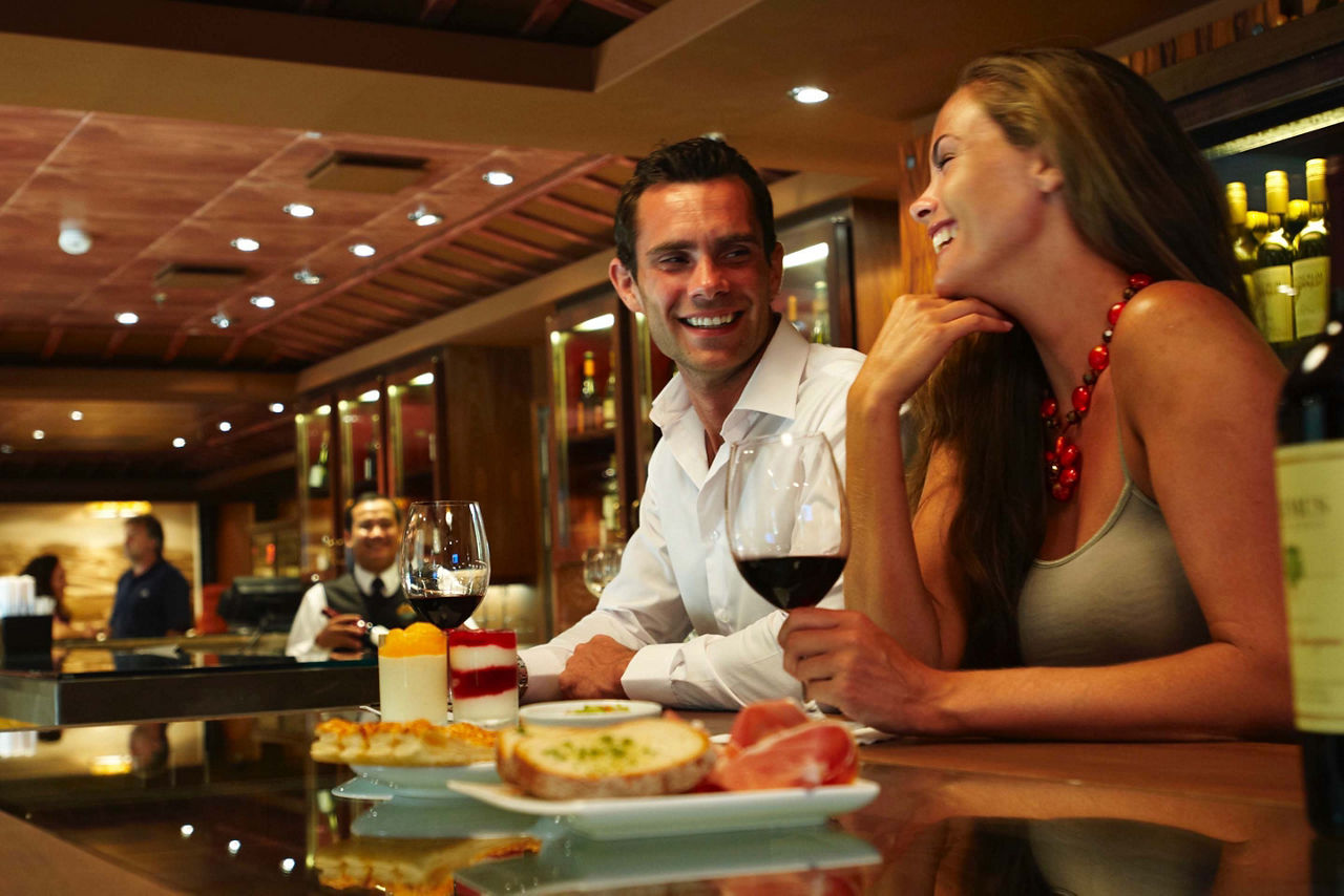 Vintages Bar Couple Laughing Wine Appetizer