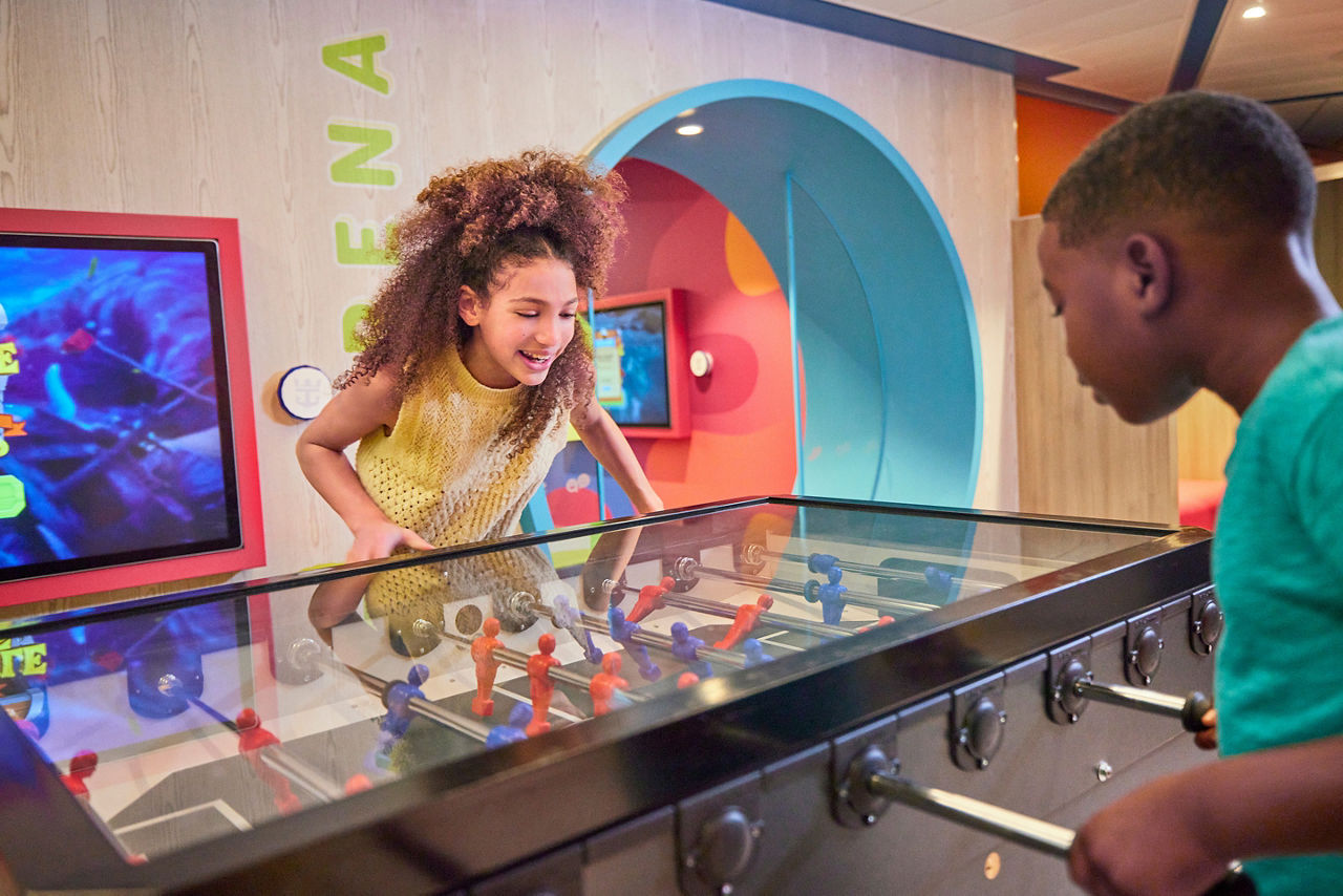 Kids Playing Foosball at Adventure Ocean