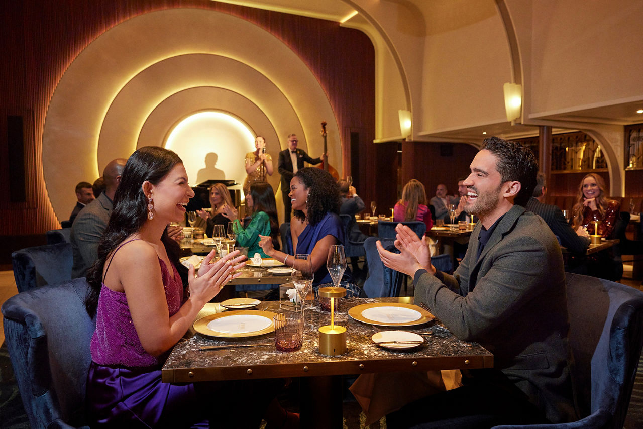 Couple Enjoying Cocktails at Empire Supper Club