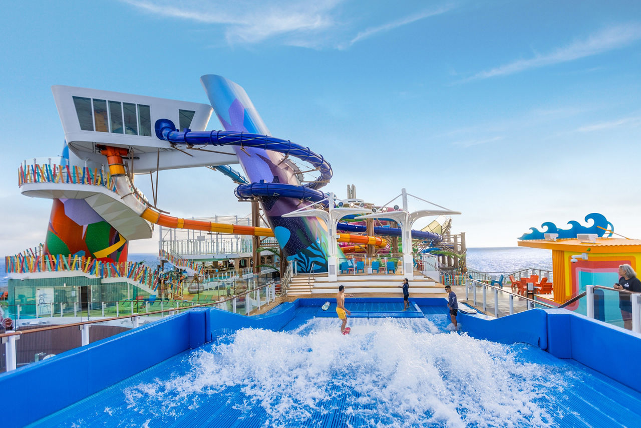 icon of the seas flowrider man standing thrill island aerial view